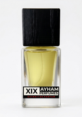 Perfume bottle with black cap and clear body on a white background