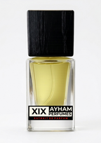 Perfume bottle with black cap and clear body on a white background